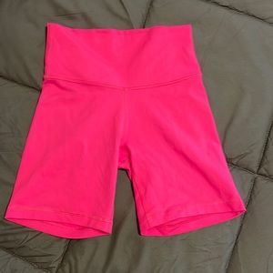 Aritizia TNA neon pink workout shorts